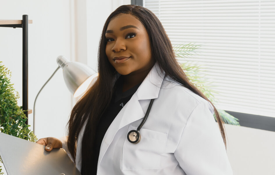 young-beautiful-african-american-girl-doctor-in-a-2023-12-20-19-46-16-utc 1 (1)